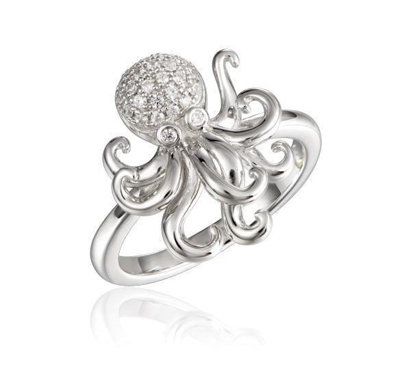 The picture shows a 925 sterling silver octopus ring with topaz gemstones