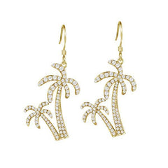 The picture shows a pair of 14K yellow gold pavé palm trees hook earrings with diamonds.