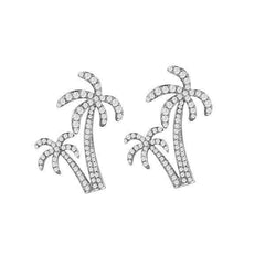 In this photo there is a pair of sterling silver double palm tree stud earrings with topaz gemstones.
