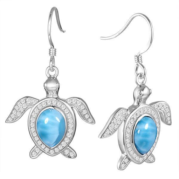 The picture shows a pair of 925 sterling silver pavé larimar sea turtle earrings.