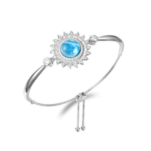 In this photo there is a 925 sterling silver sunflower bolo bracelet with one blue larimar gemstone and topaz.