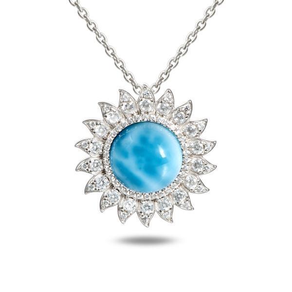 In this photo there is a sterling silver sunflower pendant with topaz and one blue larimar gemstone.