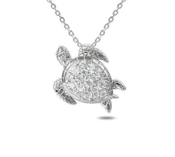 The picture shows a 925 sterling silver pavé leatherback sea turtle pendant with topaz.