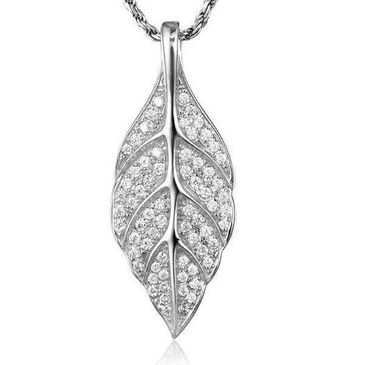 In this photo there is a white gold maile leaf pendant with topaz gemstones.