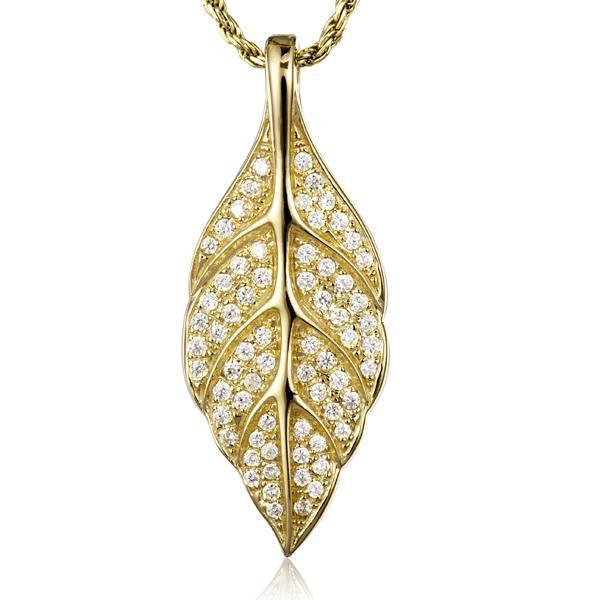 In this photo there is a yellow gold maile leaf pendant with topaz gemstones.