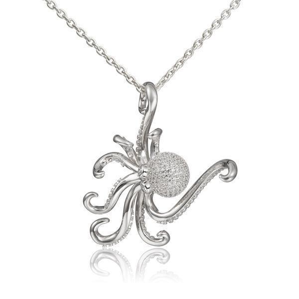 The picture shows a 925 sterling silver pavé octopus pendant with topaz.