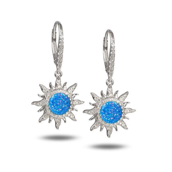 In this photo there is a pair of sterling silver sun earrings with blue opalite gemstones and topaz.