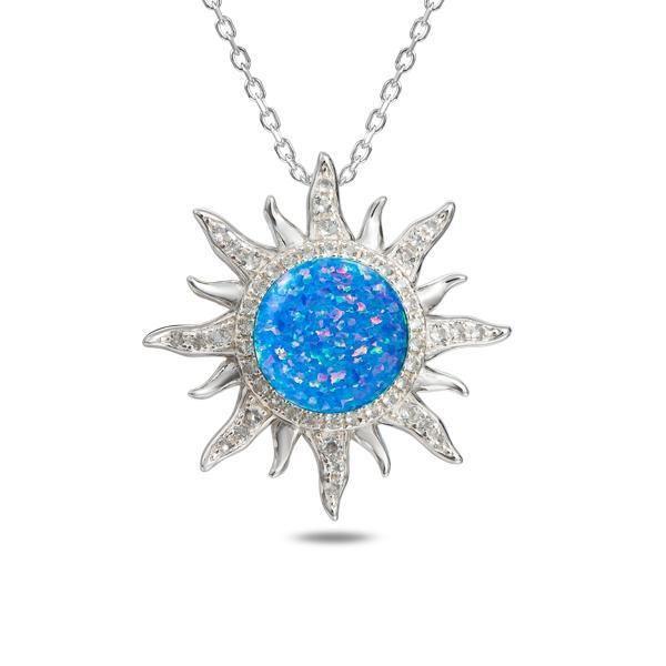 In this photo there is a sterling silver sun pendant with topaz and blue opalite gemstones.