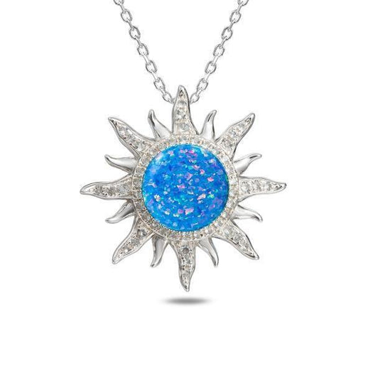 In this photo there is a sterling silver sun pendant with topaz and blue opalite gemstones.