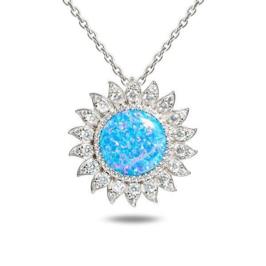In this photo there is a sterling silver sunflower pendant with topaz and one blue opalite gemstone.