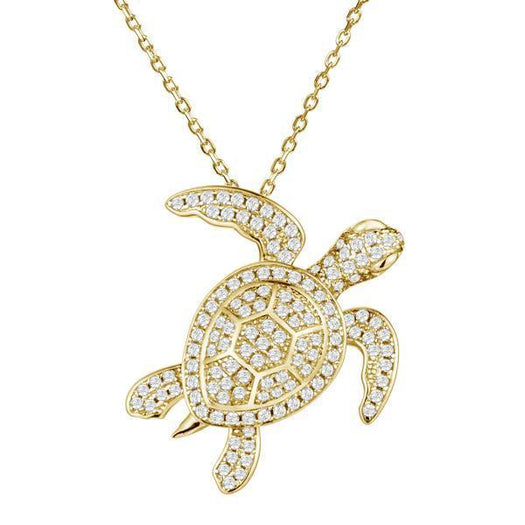 The picture shows a 925 sterling silver yellow gold vermeil sea turtle pendant with cubic zirconia.