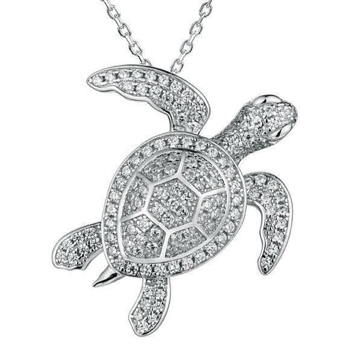 The picture shows a 925 sterling silver white gold vermeil sea turtle pendant with cubic zirconia.