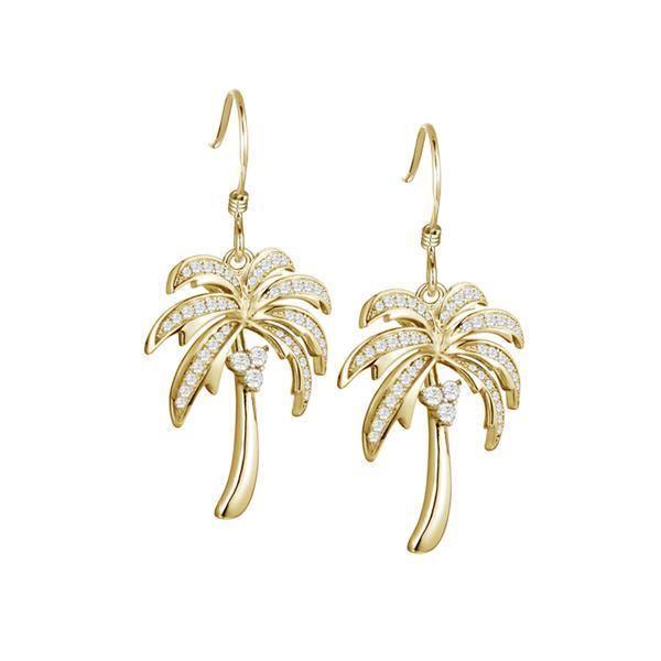 In this photo is a pair of yellow gold palm tree hook earrings with topaz gemstones.