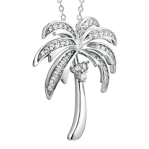 In this photo there is a white gold palm tree pendant with topaz gemstones.