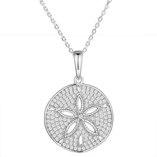The picture shows a medium 925 sterling silver, white gold vermeil, pavé sand dollar pendant with topaz.