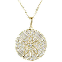 The picture shows a 14K yellow gold pavé sand dollar pendant with diamonds.