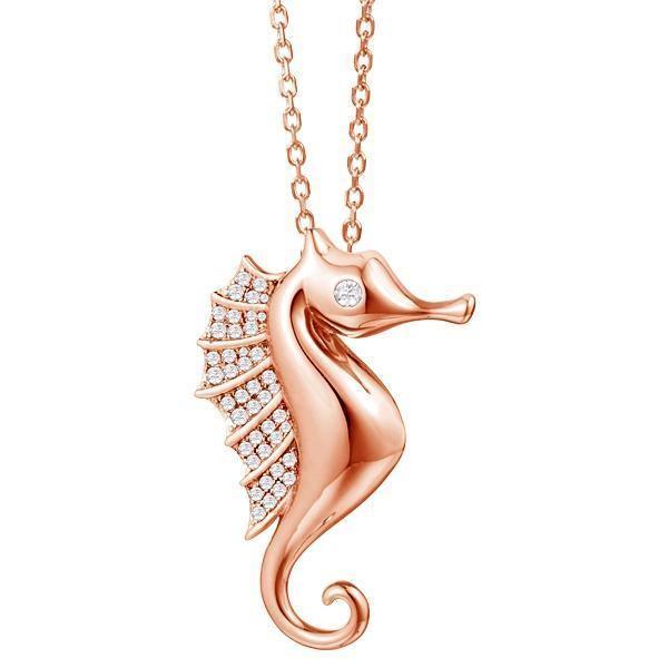 The picture shows a 925 sterling silver, rose gold vermeil, pavé seahorse pendant with topaz.