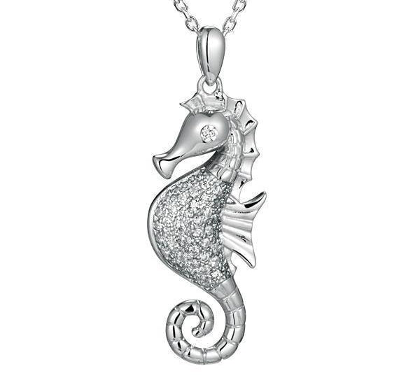 The picture shows a 925 sterling silver, white gold vermeil, pavé seahorse pendant with topaz.
