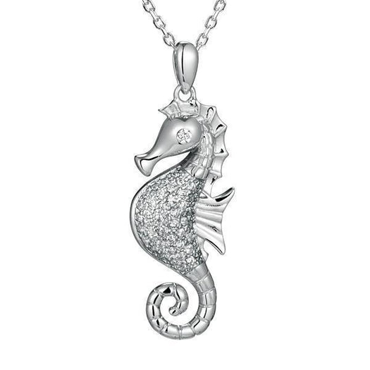 The picture shows a 925 sterling silver, white gold vermeil, pavé seahorse pendant with topaz.