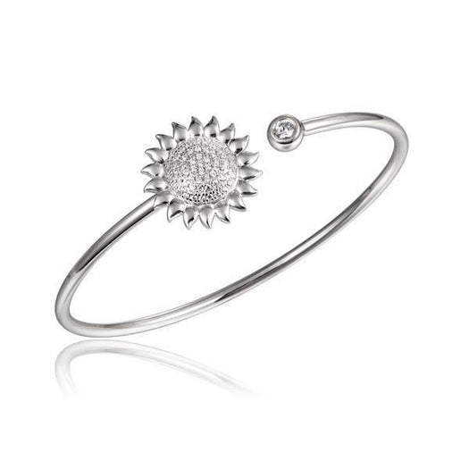 In this photo there is a sterling silver sunflower bangle with topaz gemstones.
