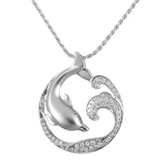 The picture shows a 925 sterling silver, white gold vermeil, dolphin and wave pendant with topaz.