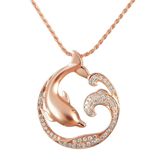 The picture shows a 925 sterling silver, rose gold vermeil, dolphin and wave pendant with topaz.