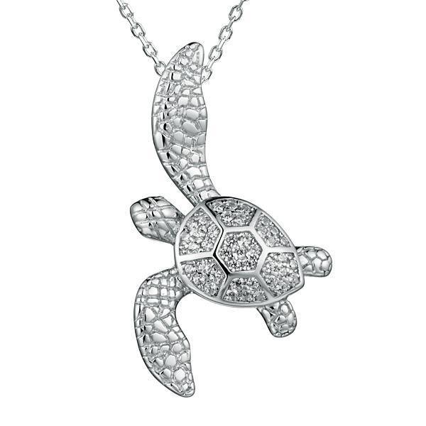 The picture shows a 925 sterling silver, white gold vermeil, sea turtle pendant with topaz.
