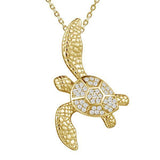 The picture shows a 925 sterling silver, yellow gold vermeil, sea turtle pendant with topaz.