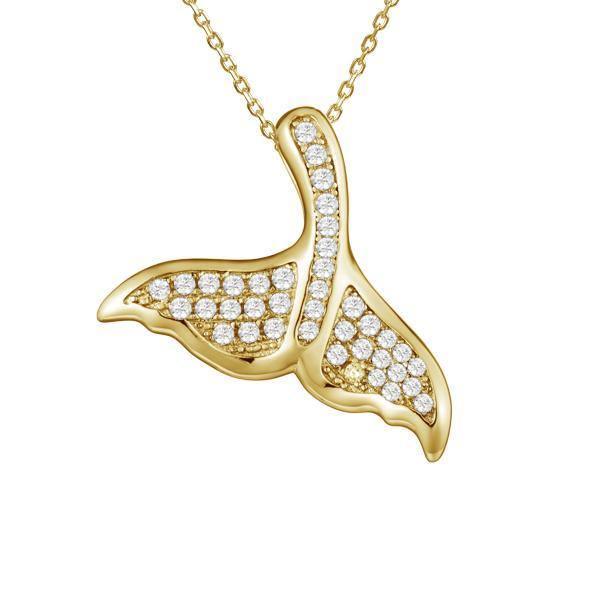 The picture shows a 925 sterling silver, yellow gold vermeil, pavé whale tail pendant with topaz.
