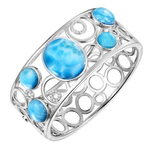 The picture shows a 925 sterling silver bangle with five larimar gemstones and topaz.