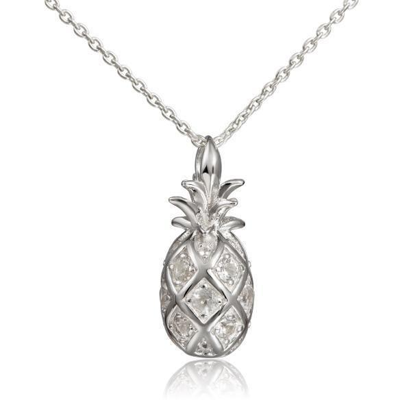 In this photo there is a sterling silver pineapple pendant with topaz gemstones.