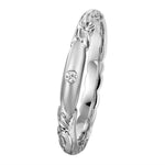 The photo shows a 3mm platinum laumania band ring with a diamond.
