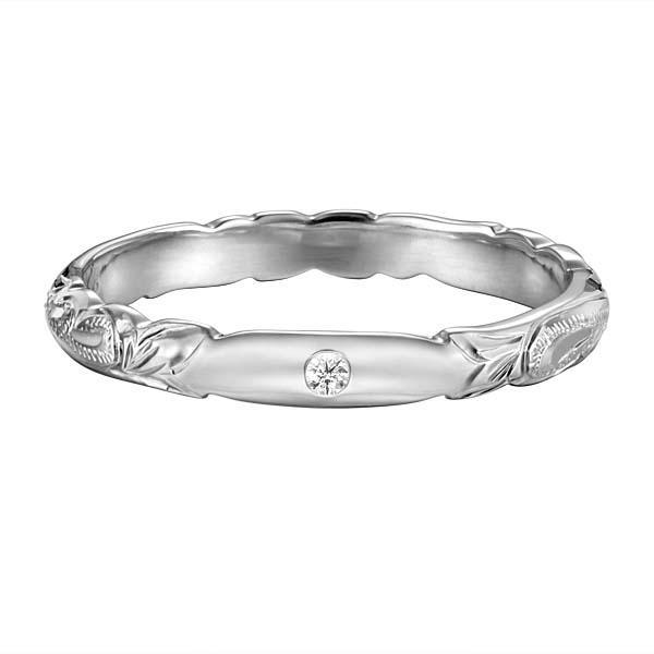 The photo shows a 3mm platinum laumania band ring with a diamond.