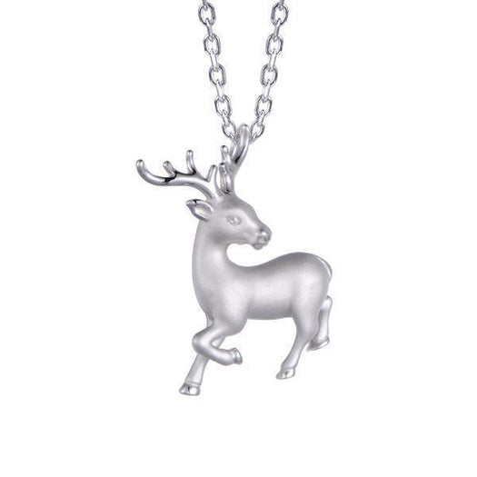 In this photo there is a sterling silver prancing reindeer pendant.