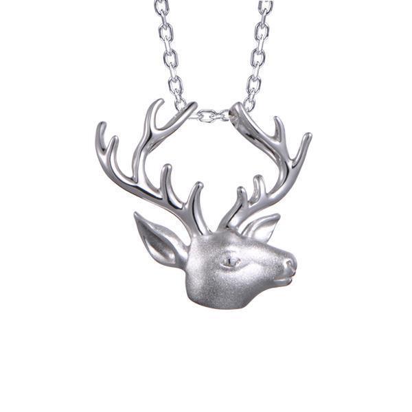 In this photo there is a sterling silver reindeer head pendant.