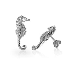 The picture shows a pair of 14K white gold seahorse stud earrings with diamonds.