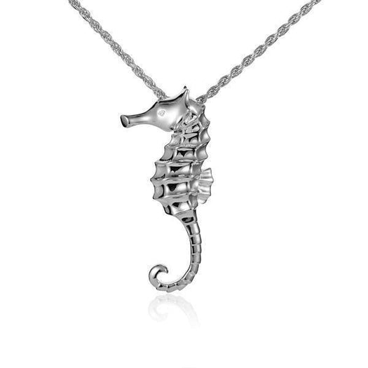 The picture shows a 14K white gold seahorse pendant with a diamond.