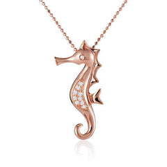 The picture shows a 14K rose gold seahorse pendant with diamonds.