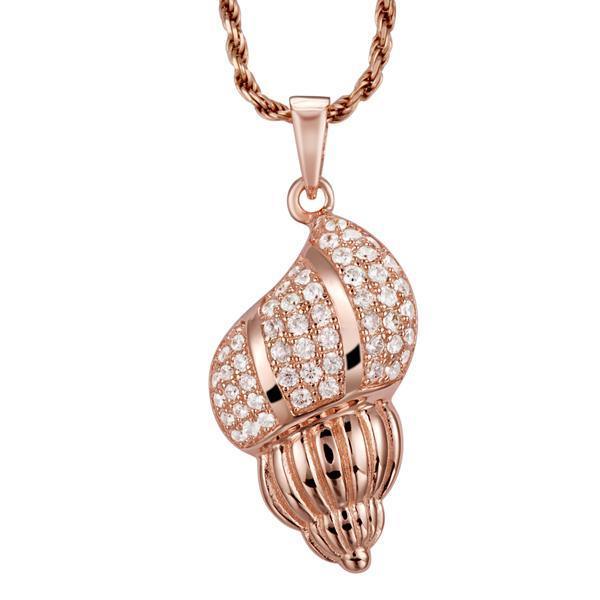 In this picture there is a rose gold seashell pendant with topaz gemstones.