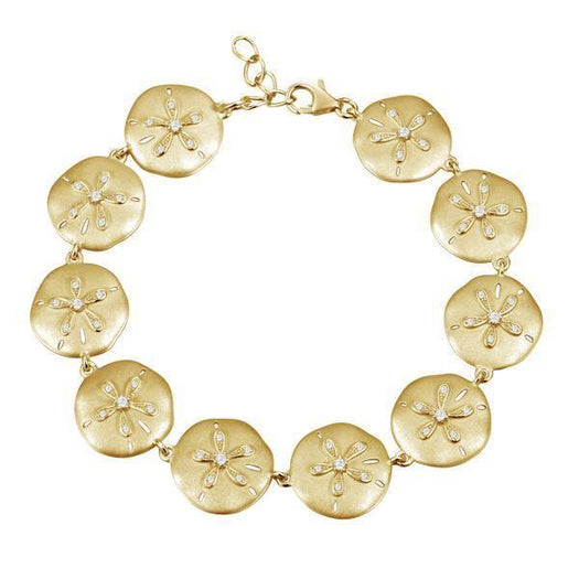 The picture shows a yellow gold sand dollar bracelet with topaz.