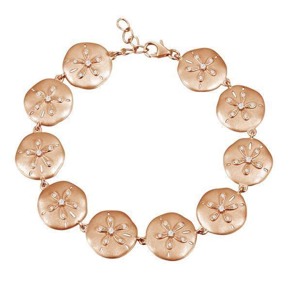 The picture shows a rose gold sand dollar bracelet with topaz.
