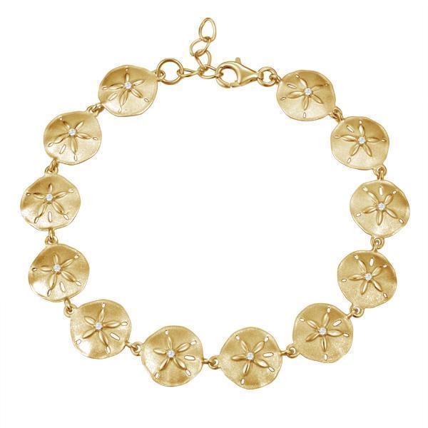 The picture shows a yellow gold sand dollar bracelet with topaz
