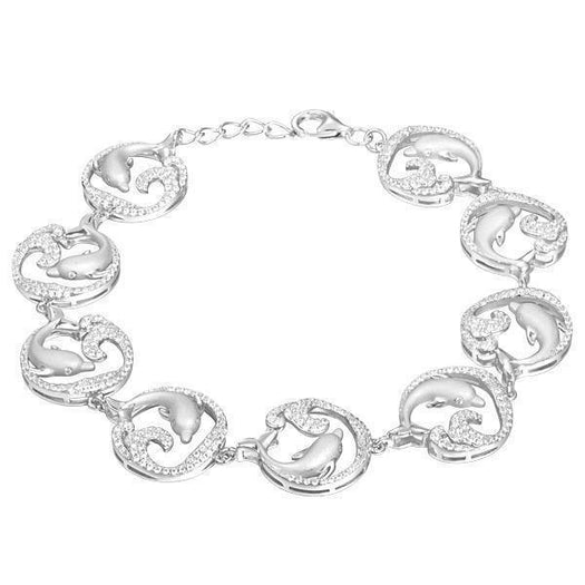 The picture shows a white gold dolphin bracelet with topaz.