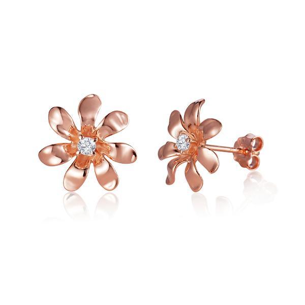 In this photo there is a pair of rose gold tiare flower stud earrings with diamonds.