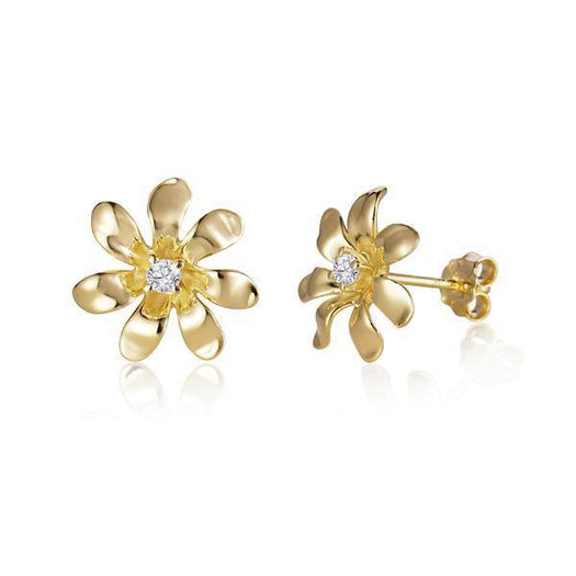 In this photo there is a pair of yellow gold tiare flower stud earrings with diamonds.