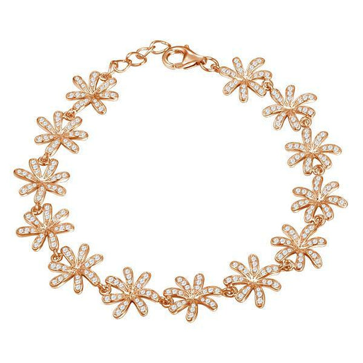 In this photo there is a rose gold tiare gardenia bracelet with topaz gemstones.