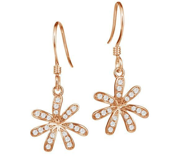 In this photo there is a pair of rose gold tiare gardenia dangle earrings with topaz gemstones.