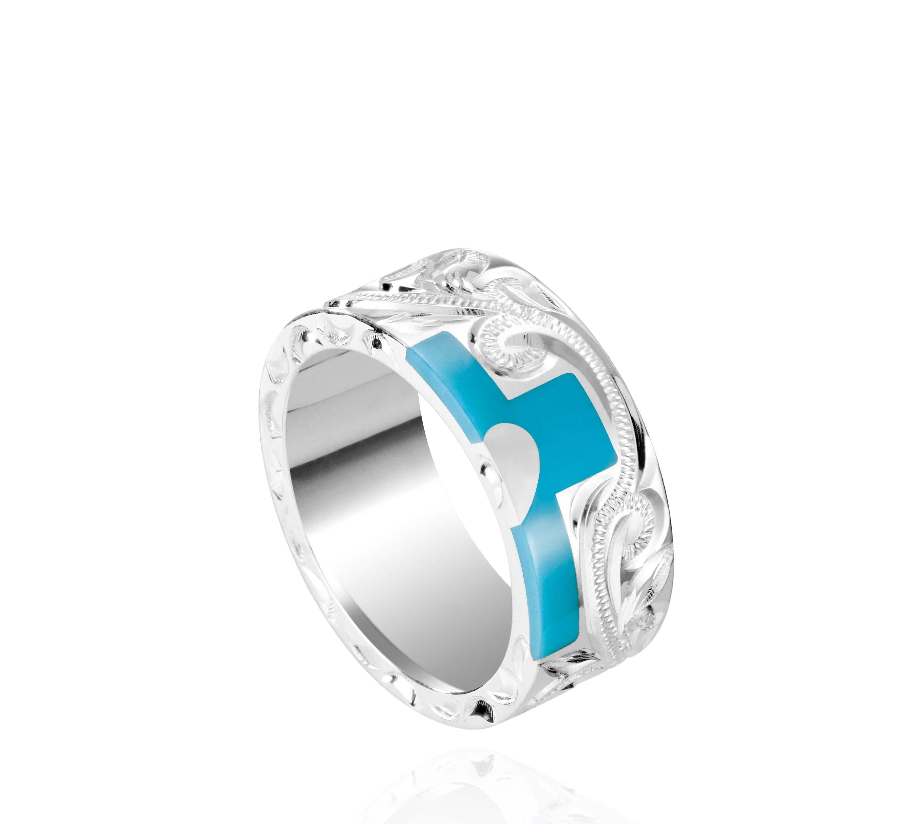 The picture shows a part of a set 925 sterling silver right half cross ring with hand-engravings, heart, and a turquoise gemstone.