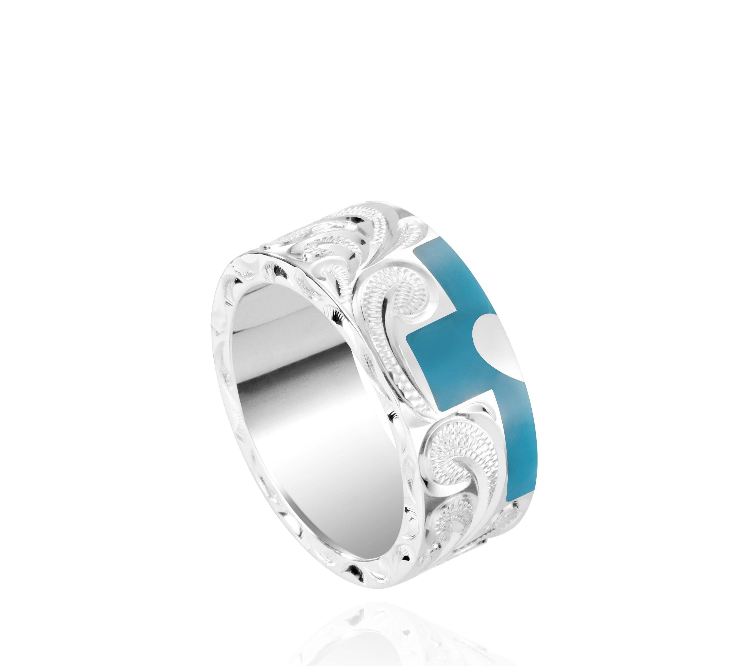 The picture shows a part of a set 925 sterling silver left half cross ring with hand-engravings, heart, and a turquoise gemstone.