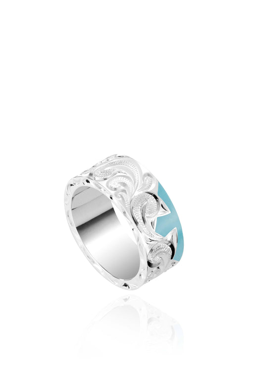 The picture shows a part of a set 925 sterling silver left half cross ring with hand-engravings and a turquoise gemstone.